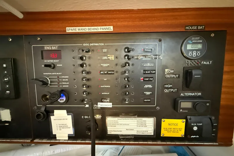 Slide: The Image of Electrical control panel of a 2018 J Boats J/121 sailboat, featuring various switches and gauges. - 34