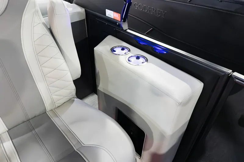 Slide: The Image of 2026 Godfrey Monaco 255 Split Bench interior with luxurious seating and illuminated cup holders. - 30