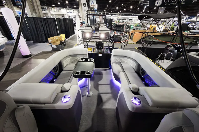 Slide: The Image of Luxurious 2026 Godfrey Monaco 255 Split Bench pontoon boat interior with ambient lighting. - 33