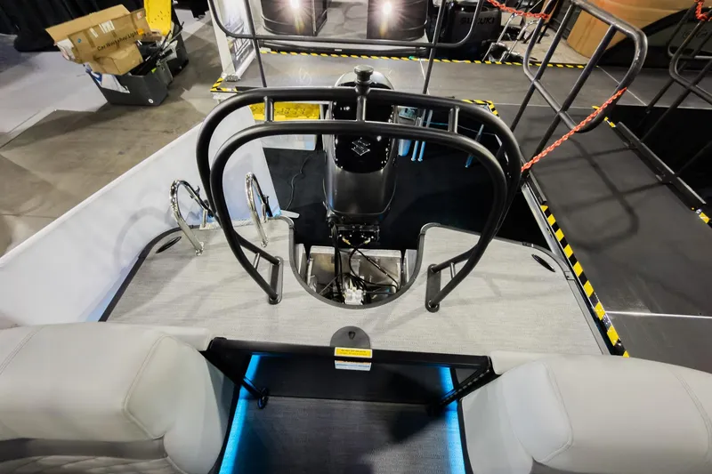 Slide: The Image of 2026 Godfrey Monaco 255 Split Bench boat interior with modern seating and safety railings. - 38