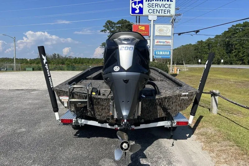 Slide: The Image of 2026 Xpress H22 boat with Yamaha engine at marine service center. - 8