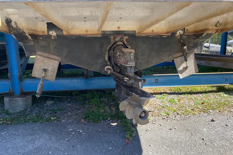 Slide: The Image of Rear view of a 2003 Rinker Fiesta Vee 270 boat on a trailer. - 5