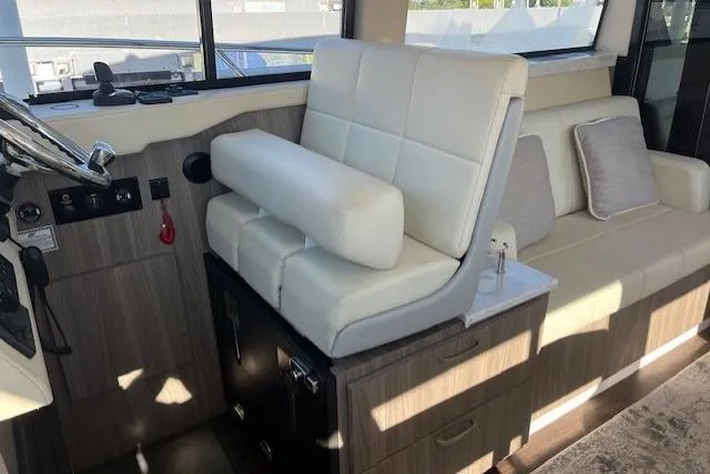 Slide: The Image of Luxurious interior of 2022 Regal 38 XO yacht with plush seating and modern design. - 17