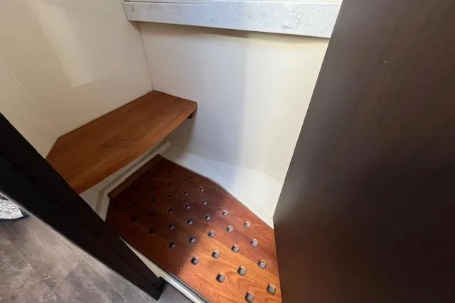 Slide: The Image of 2022 Regal 38 XO interior with wooden flooring and seating area. - 30