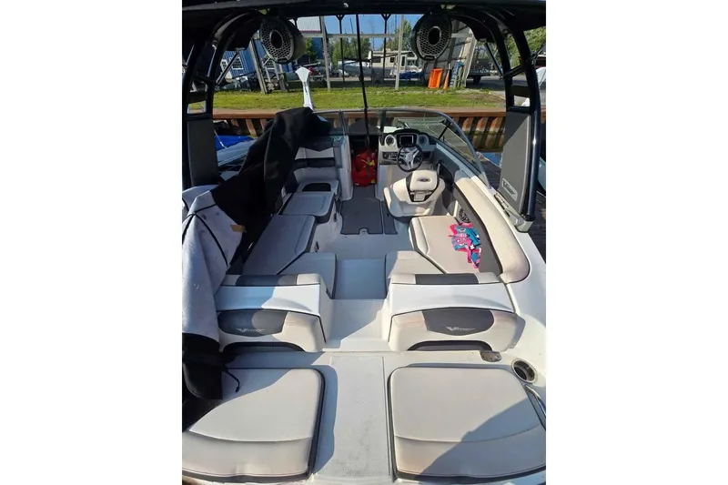 Slide: The Image of 2017 Chaparral Vortex 203 VR boat interior with seating and dashboard view. - 11