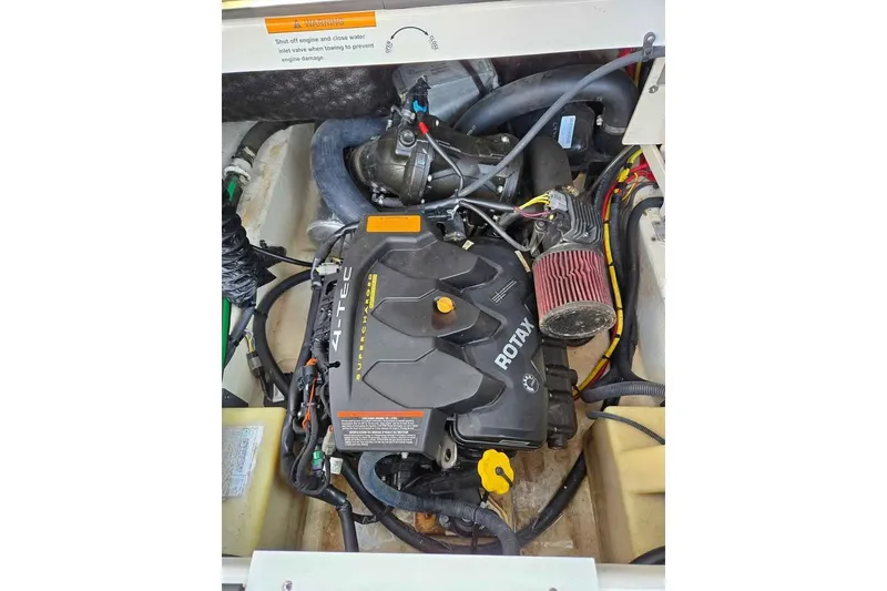 Slide: The Image of Engine compartment of a 2017 Chaparral Vortex 203 VR with Rotax 4-TEC engine. - 13