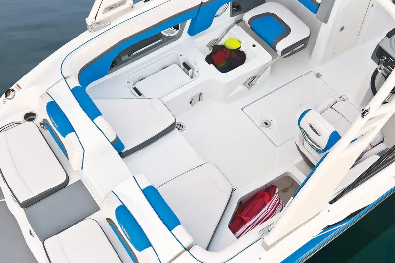 Slide: The Image of Manufacturer Provided Image: 2017 Chaparral Vortex 203 VR boat interior with blue and white seating. - 21