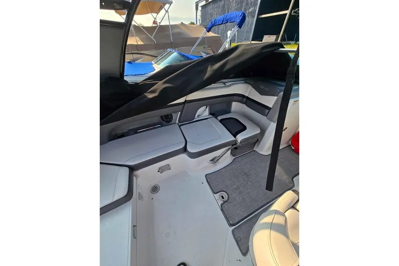 Slide: The Image of 2017 Chaparral Vortex 203 VR boat interior with seating and storage. - 9