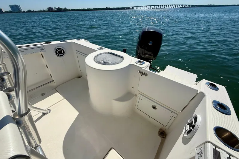 Slide: The Image of 2001 Aquasport 205 Osprey boat interior with ocean view and bridge in background. - 24