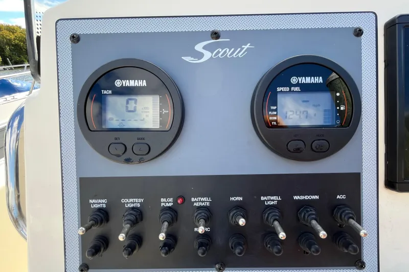 Slide: The Image of Control panel of a 2020 Scout 195 Sportfish boat with Yamaha gauges and switches. - 13