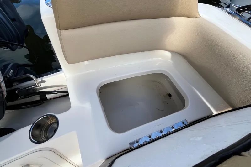 Slide: The Image of 2020 Scout 195 Sportfish boat seat with storage compartment, beige upholstery. - 25