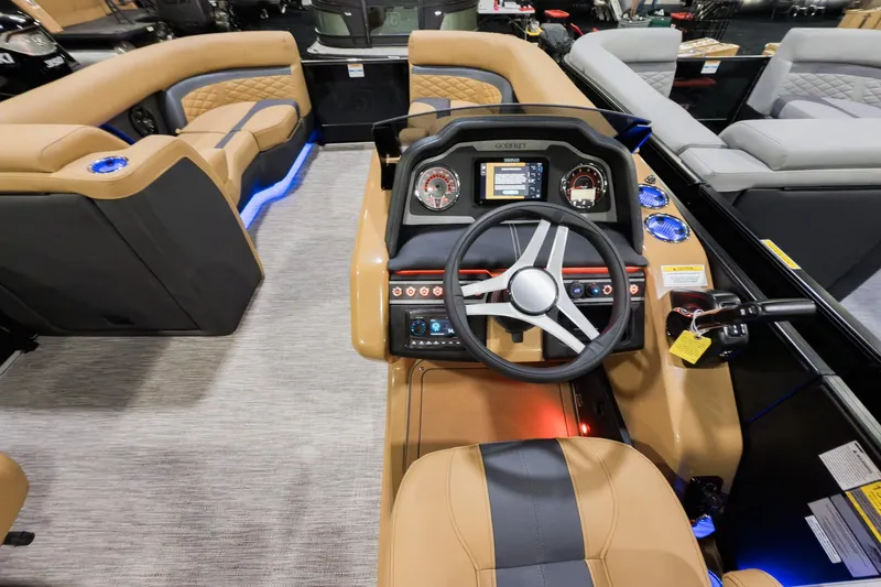 Slide: The Image of Interior view of 2026 Godfrey Monaco 235 Ultra Lounge boat with modern dashboard and seating. - 10