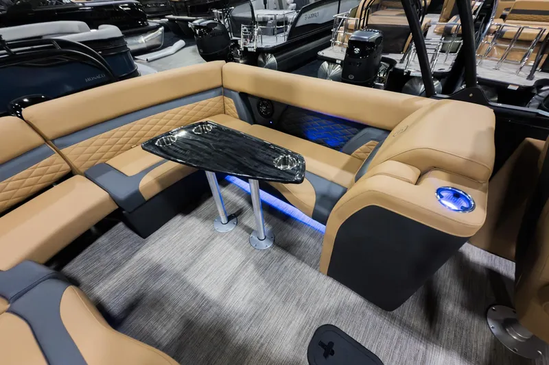 Slide: The Image of Luxurious interior of 2026 Godfrey Monaco 235 Ultra Lounge with elegant seating and modern table. - 18