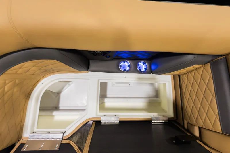 Slide: The Image of Luxurious interior of 2026 Godfrey Monaco 235 Ultra Lounge with quilted seating and LED cup holders. - 6