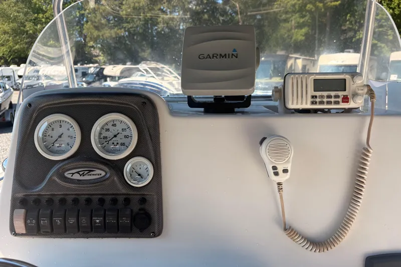 Slide: The Image of Dashboard of 2015 Tidewater 198 CC Adventure with Garmin GPS and radio equipment. - 13