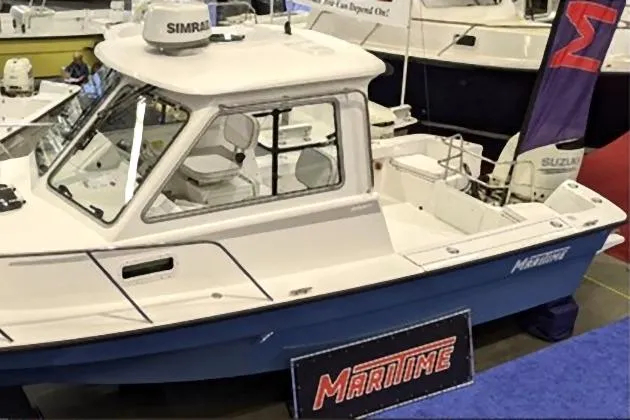 Slide: The Image of 2020 Maritime 23 Challenger boat displayed at a marine exhibition. - 26