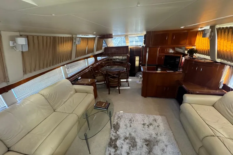 Slide: The Image of Luxurious interior of 2004 Carver 564 Cockpit Motor Yacht with elegant furnishings. - 30