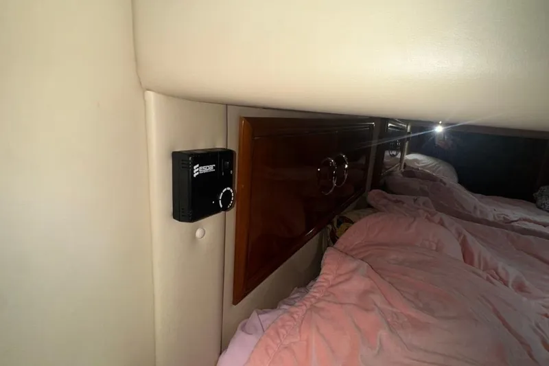 Slide: The Image of Interior of 2004 Carver 564 Cockpit Motor Yacht with Espar heater and cozy bedding. - 40