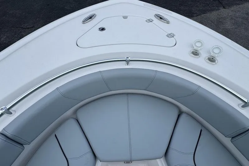 Slide: The Image of Bow seating area of 2026 Sportsman Heritage 231 Center Console boat, featuring sleek design. - 16