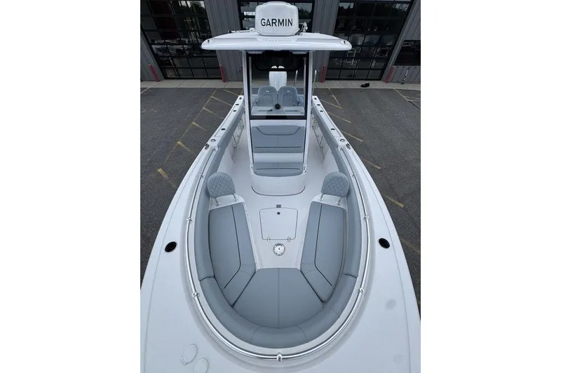 Slide: The Image of 2026 Sportsman Heritage 231 Center Console boat with spacious seating and modern design. - 19