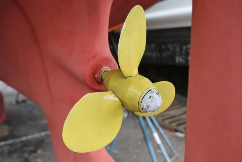 Slide: The Image of Yellow propeller of a 2004 Pacific Seacraft 40 sailboat. - 100