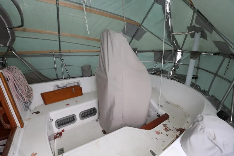 Slide: The Image of Covered cockpit of a 2004 Pacific Seacraft 40 sailboat under a protective canopy. - 102