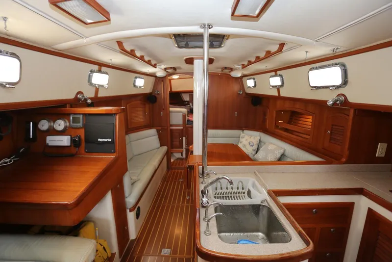 Slide: The Image of Interior of 2004 Pacific Seacraft 40 sailboat with wood finish and modern amenities. - 27