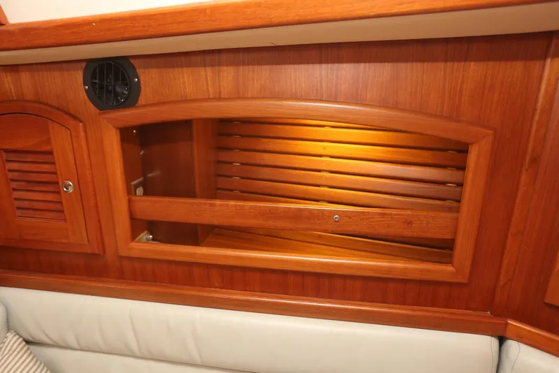 Slide: The Image of Wooden interior of 2004 Pacific Seacraft 40 sailboat, featuring elegant cabinetry and lighting. - 52