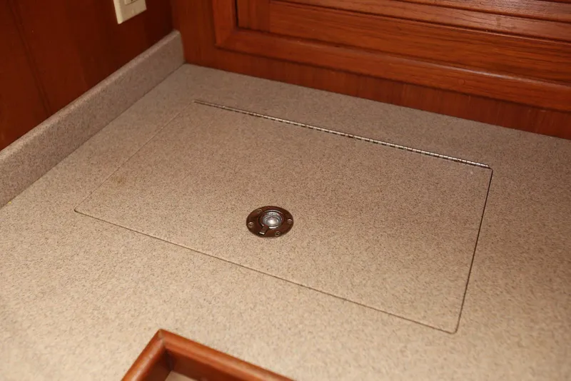 Slide: The Image of Countertop with integrated sink cover on 2004 Pacific Seacraft 40 yacht. - 54