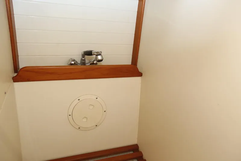 Slide: The Image of Interior of 2004 Pacific Seacraft 40 sailboat, featuring a compact sink area. - 63