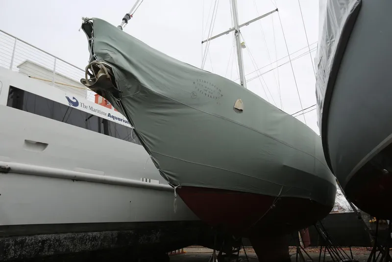 Slide: The Image of Covered 2004 Pacific Seacraft 40 sailboat in storage at a marina. - 86