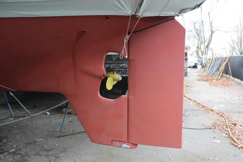 Slide: The Image of 2004 Pacific Seacraft 40 sailboat rudder and propeller detail in dry dock. - 92