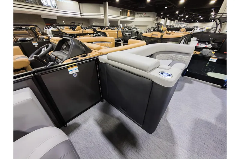 Slide: The Image of 2026 Godfrey Monaco 235 Ultra Lounge boat interior with luxurious seating and modern design. - 19