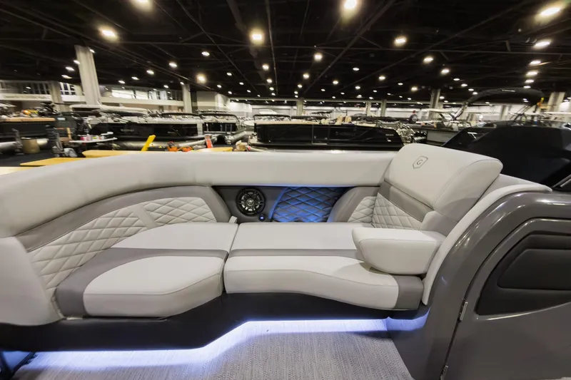 Slide: The Image of Luxurious interior of 2026 Godfrey Monaco 235 Ultra Lounge boat, featuring elegant seating and ambient lighting. - 6