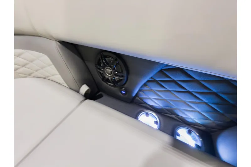 Slide: The Image of 2026 Godfrey Monaco 235 Ultra Lounge interior with speaker and ambient lighting. - 7