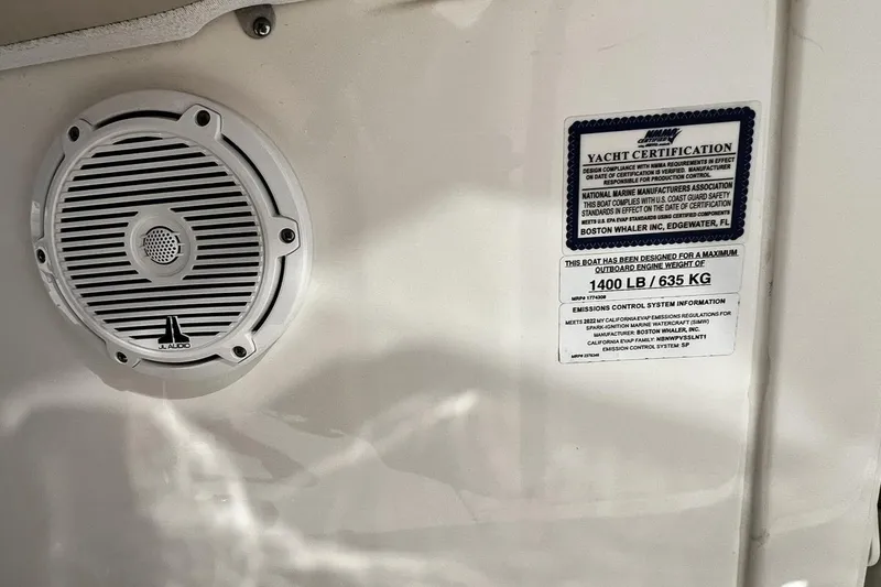 Slide: The Image of Speaker and certification label on 2022 Boston Whaler 280 Outrage boat. - 17