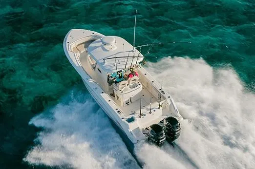 Slide: The Image of Manufacturer Provided Image: 2022 Boston Whaler 280 Outrage cruising on clear turquoise waters. - 26