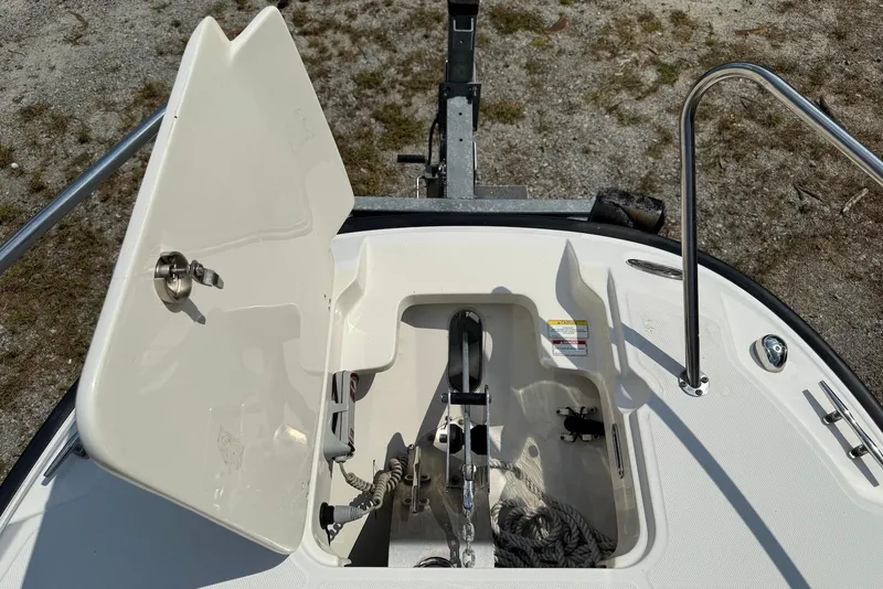 Slide: The Image of Open anchor storage on 2017 Boston Whaler 270 Dauntless boat. - 8