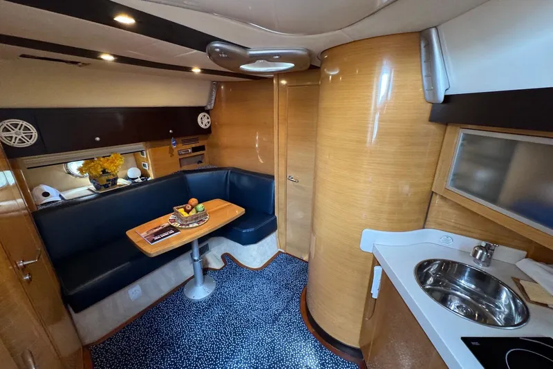Slide: The Image of Luxurious interior of 2009 Cranchi Mediterranee 43 yacht with modern seating and kitchenette. - 25