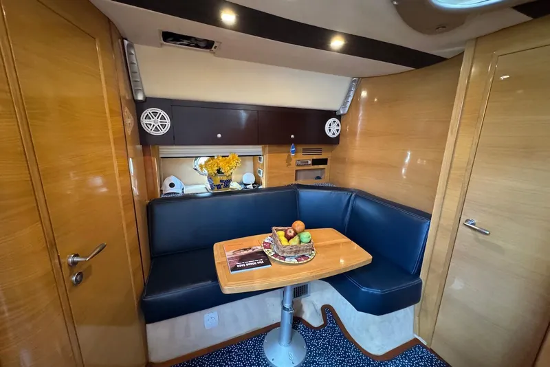 Slide: The Image of Luxurious 2009 Cranchi Mediterranee 43 yacht interior with cozy seating and elegant decor. - 28