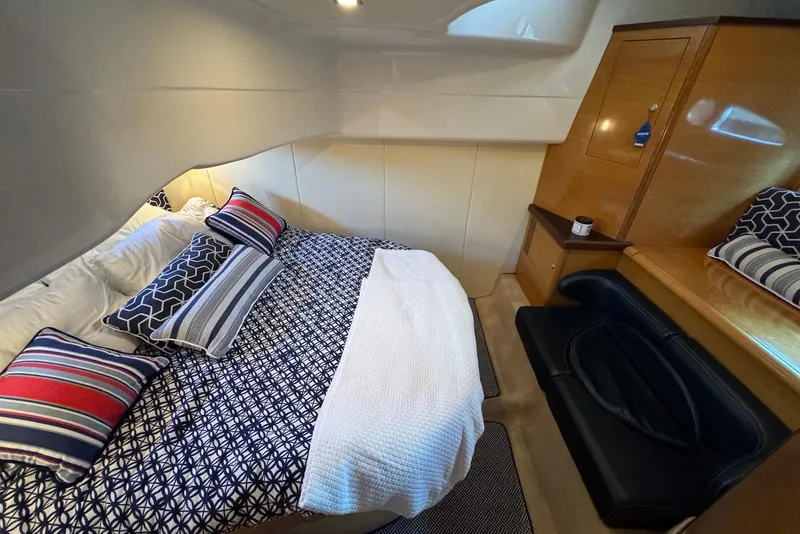 Slide: The Image of Luxurious cabin interior of 2009 Cranchi Mediterranee 43 yacht with stylish bedding. - 31