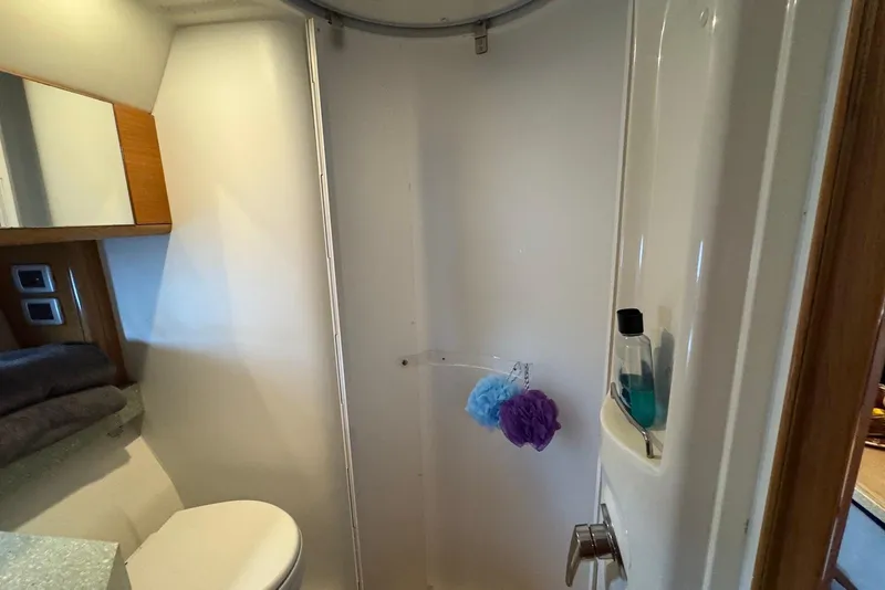 Slide: The Image of Bathroom interior of 2009 Cranchi Mediterranee 43 yacht, featuring shower and toiletries. - 35