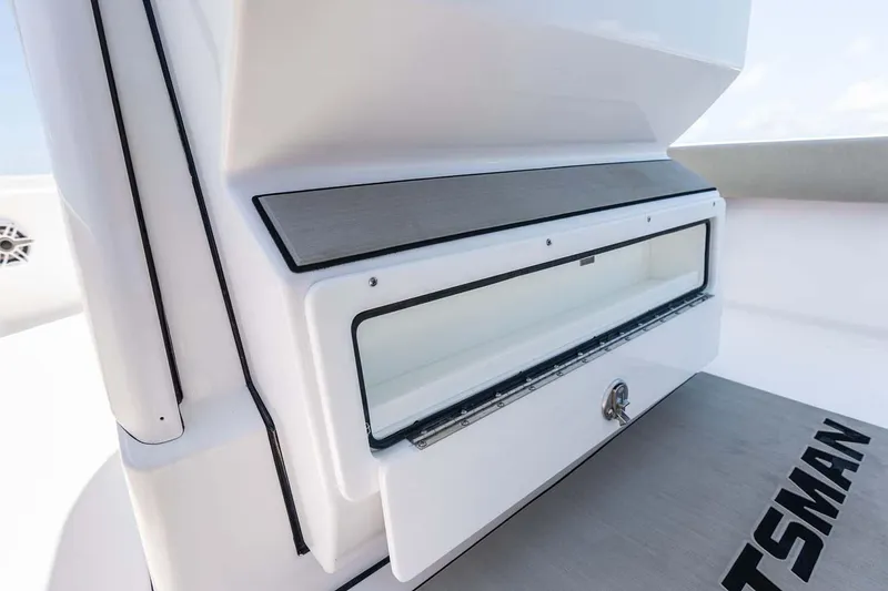 Slide: The Image of Manufacturer Provided Image: 2025 Sportsman Masters 247 Bay Boat storage compartment detail. - 25