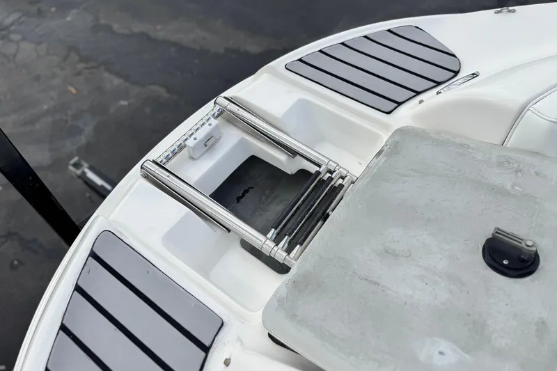 Slide: The Image of 2005 MB 240 V Sportdeck boat ladder and deck detail, featuring sleek design elements. - 13