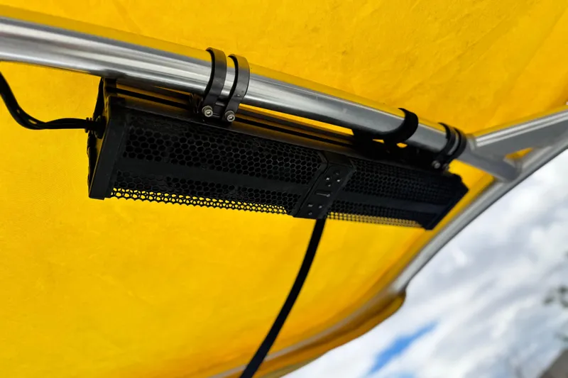 Slide: The Image of Close-up of a 2005 MB 240 V Sportdeck canopy with mounted black speaker. - 16