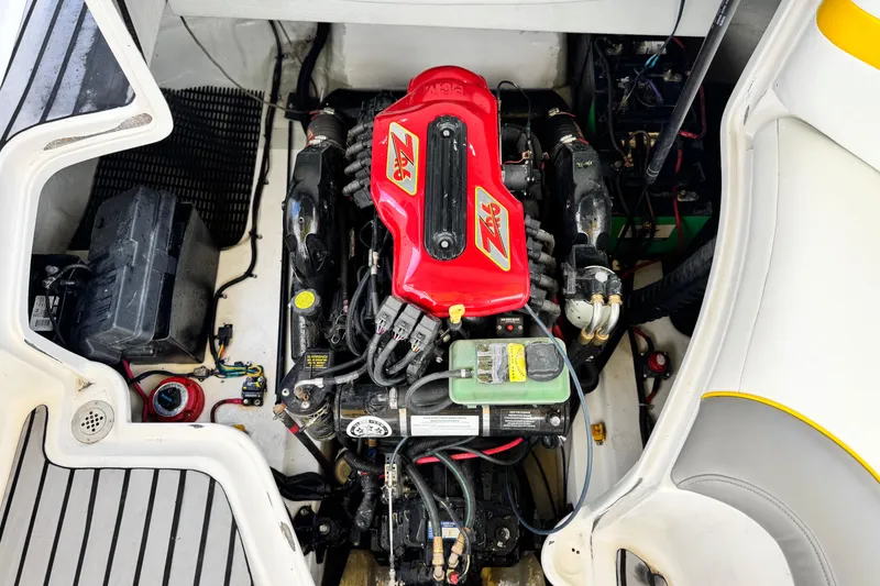 Slide: The Image of 2005 MB 240 V Sportdeck engine compartment with red ZR6 engine. - 24