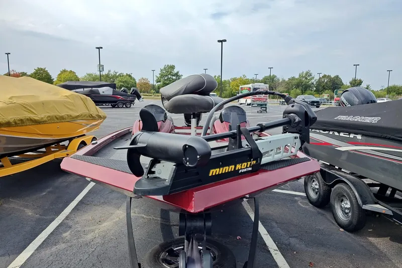 Slide: The Image of 2018 Ranger RT198P boat with Minn Kota motor in parking lot. - 6