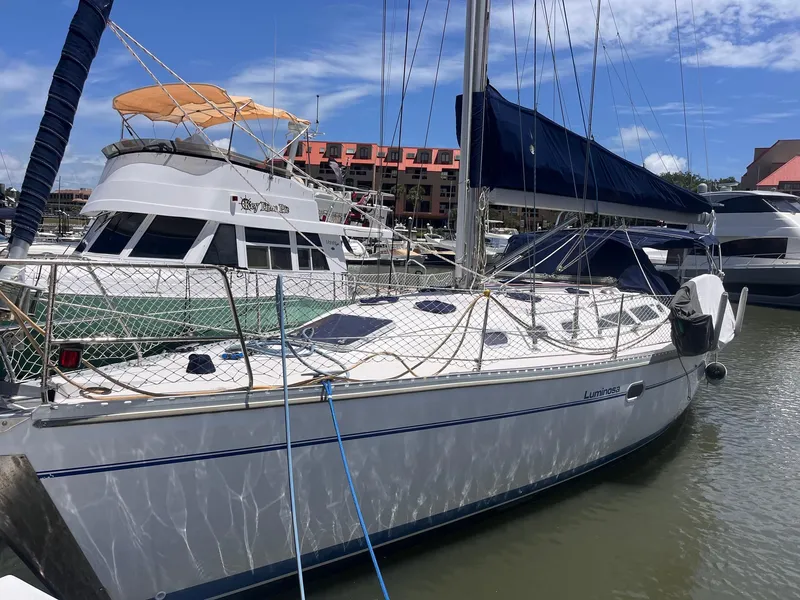 The Image of 2001 Catalina 400 MkII sailboat docked in marina under blue sky. - 0
