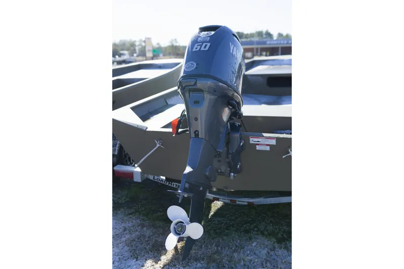 Slide: The Image of 2026 G3 Gator Tough 1860 VBW boat with Yamaha outboard motor, rear view. - 10