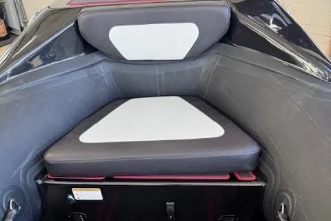 Slide: The Image of 2025 Highfield Jet 420 boat interior seating with black and white upholstery. - 12